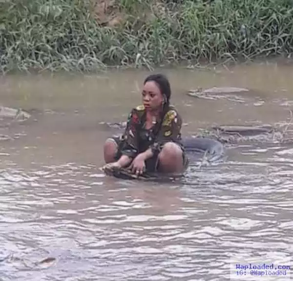 Photo: See What This Beautiful Girl Was Caught Doing Inside A Dirty Water